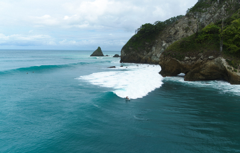 Across the bay — hidden right-hand point breaks